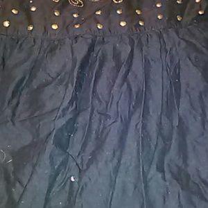 Women dress gold and black